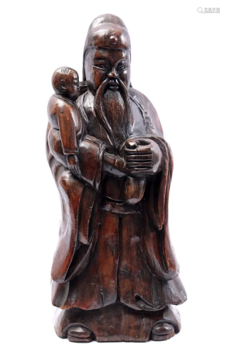 Wooden carved statue