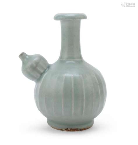 A CELADON GLAZED PORCELAIN EWER (KENDI), WITH RIBBER BODY. I...