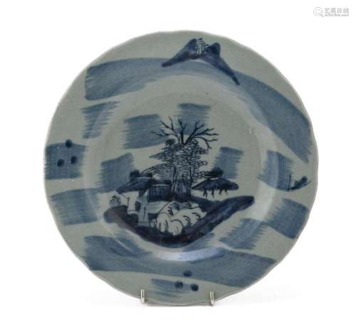 A CELADON GROUND PORCELAIN DISH, CHINA LATE 19TH, EARLY 20TH...