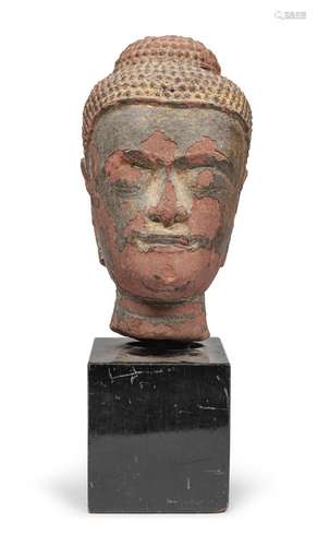 A RARE RED SANDSTONE HEAD OF BUDDHA, THAILAND, 17TH CENTURY