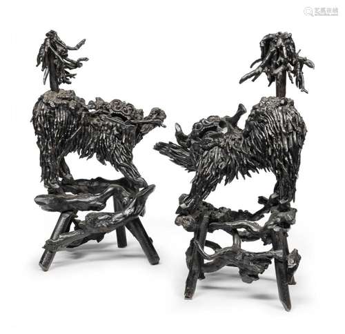 A RARE PAIR OF WOODEN ROOTS BUDDHIST LIONS, WITH GLASS EYES,...