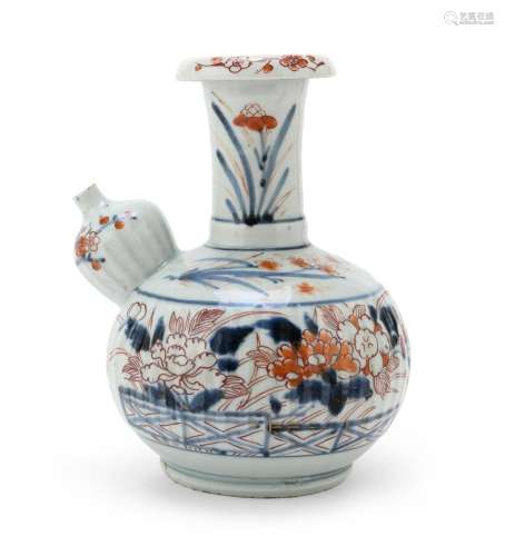 A PORCELAIN DECORATED AND GLAZED EWER (KENDI). IMARI WARE IN...