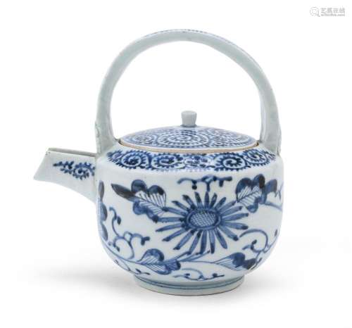A BLUE AND WHITE PORCELAIN SAKE PITCHER DECORATED WITH KARAK...