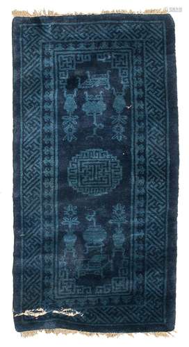 A CHINESE BLUE GROUND CARPET. BEIJING LATE 19TH CENTURY