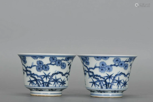 TWO CHINESE BLUE-AND-WHITE CUPS DEPICTING 'THREE FRIEND...