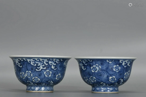 TWO CHINESE BLUE-AND-WHITE CUPS DEPICTING 'FLORAL'...