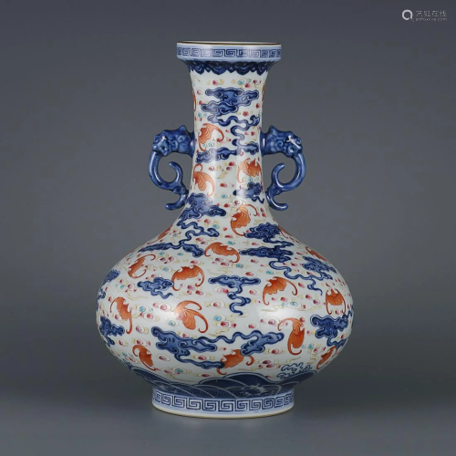 CHINESE BLUE-AND-WHITE AND IRON-RED ENAMELED BEAST-HANDLED V...