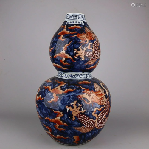 CHINESE BLUE-AND-WHITE AND IRON-RED ENAMELED DOUBLE-GOURD VA...