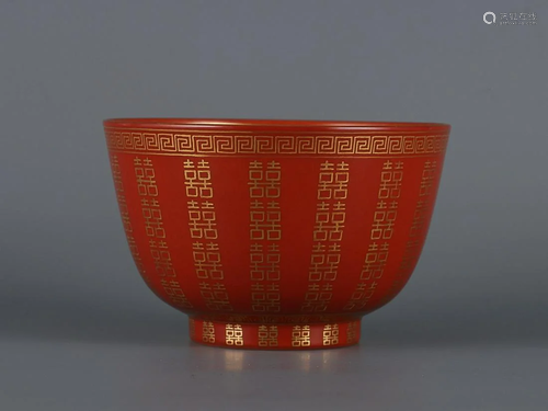 CHINESE GILDED ON CORAL-RED-GLAZED BOWL DEPICTING 'HUND...