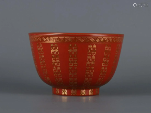 CHINESE GILDED ON CORAL-RED-GLAZED BOWL DEPICTING 'HUND...