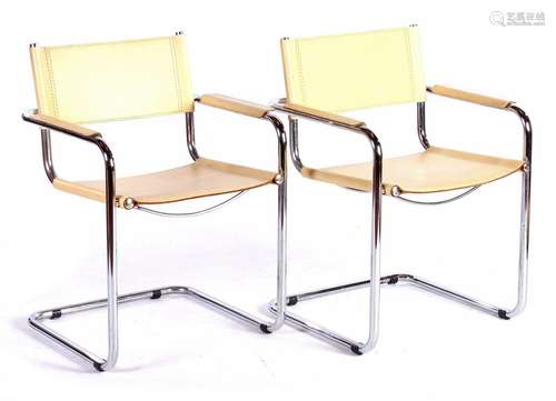 2 tubular frame armchairs