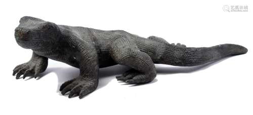 Bronze statue of a monitor lizard