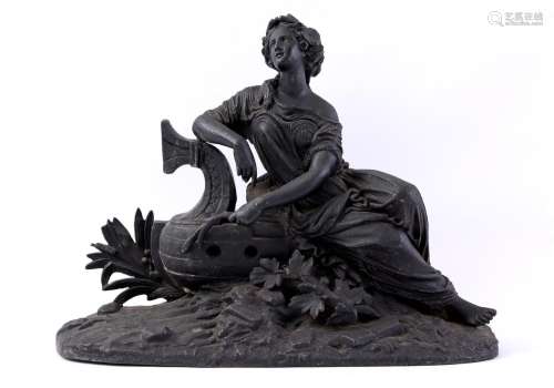 Metal sculpture of a mythological figure
