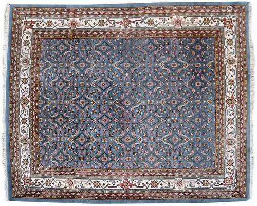 Woolen hand-knotted carpet