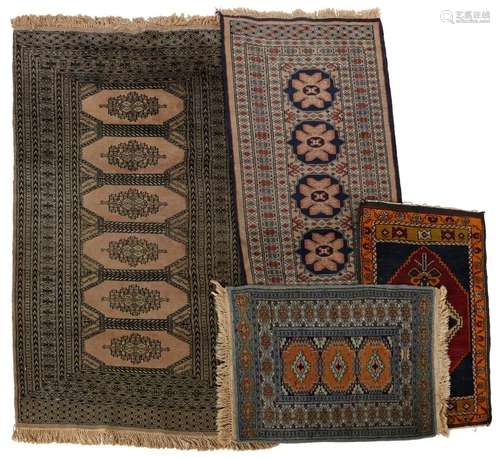 4 hand-knotted wool carpets