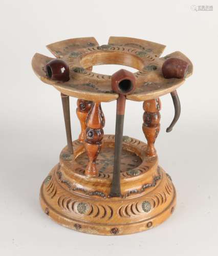 Antique pipe stove with music box, 1900
