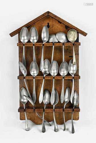 Antique spoon rack with tin spoons, 1900