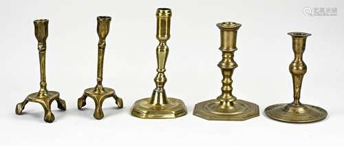 Five antique candlesticks