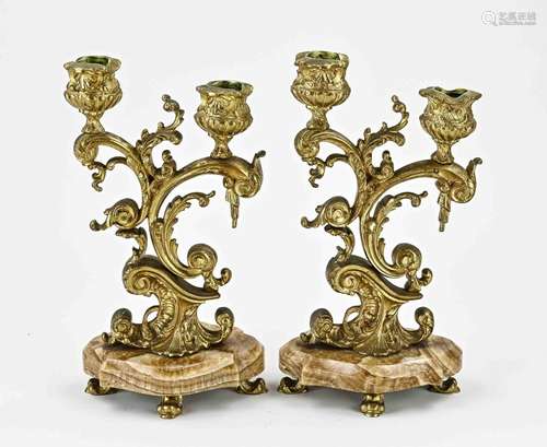 Two gold plated candlesticks, H 25 - 26 cm.