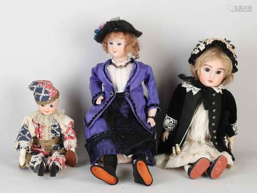 Three porcelain dolls