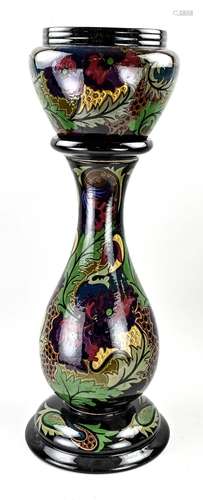 Antique pottery vase on a column, 1910