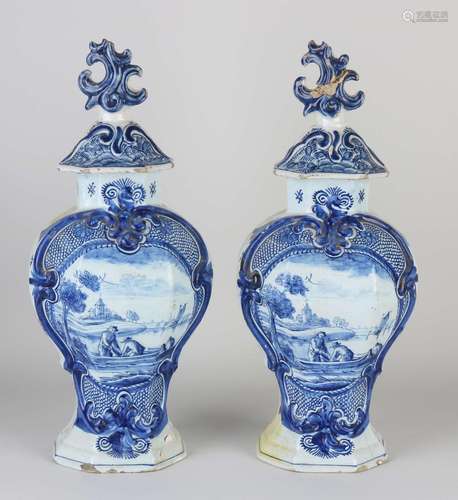 Two 18th century Delft vases with lids, H 36 cm.