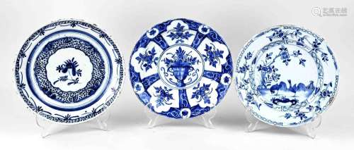 Three 18th century Delft plates Ø 22 - 23 cm.
