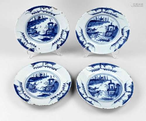 Four 18th century Delft plates Ø 23.5 cm.