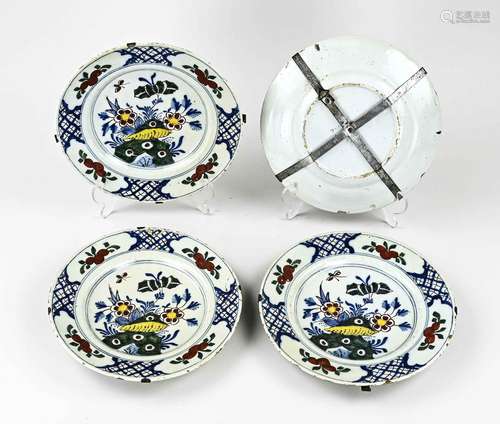 Four 18th century Delft plates Ø 23 cm.