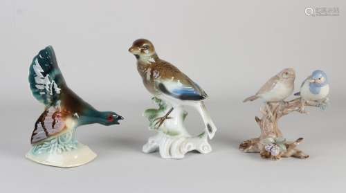 Three pottery/porcelain birds