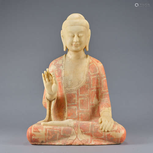 A carved stone figure of sitting buddha,Northern Qi dynasty