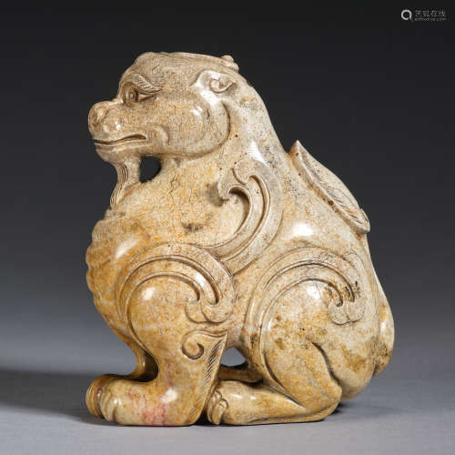 An calcified jade 'auspicious beast' ornament, Tang dynasty