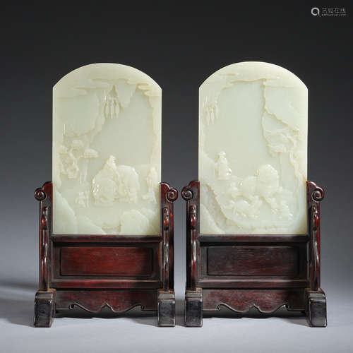 A pair of inscribed jade 'figural and floral' table screens,...