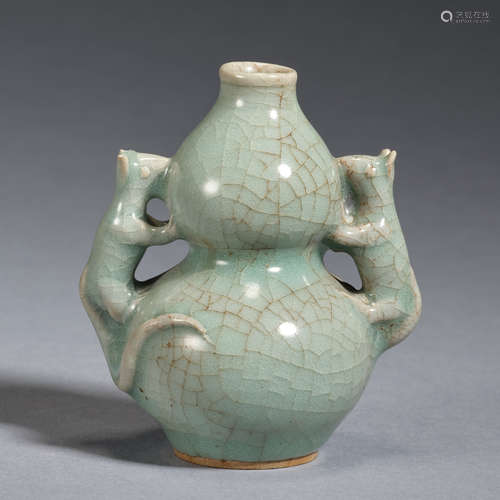 A 'Longquan' celadon waterpot , one of the animals has two b...