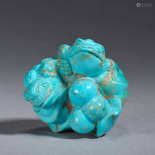 A turquoise carving of a three-legged mythical 'jin chan' to...