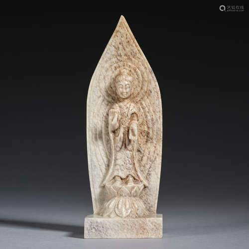 A small calcified jade standing Buddha, Northern Wei dynasty