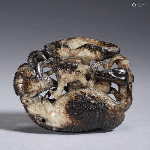 A jade ‘goose and hawk’ reticulated plaque ,Yuan dynasty