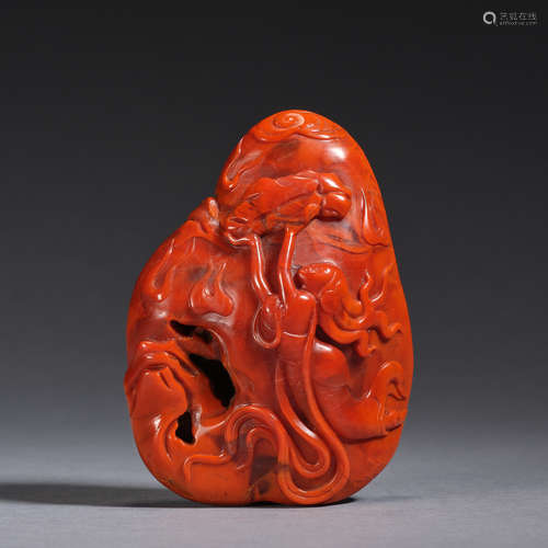 A red agate carving of 'Nuwa mending the sky' ,Qing dynasty