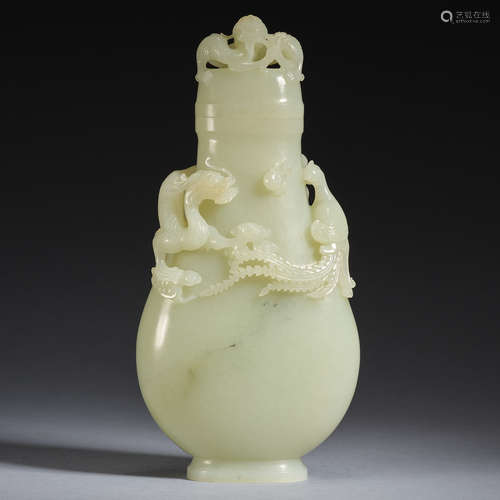 A jade 'Dragon and Phoenix handle' vase with cover,Qing dyna...