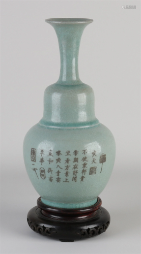 Chinese vase on console, H 28 cm.