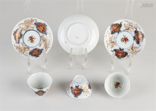 Three Imari porcelain cups and saucers