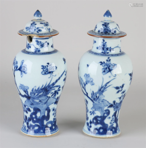 Two 18th century Chinese lidded vases, H 22 cm.