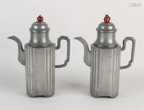 Two antique Chinese pewter pitchers, 1900