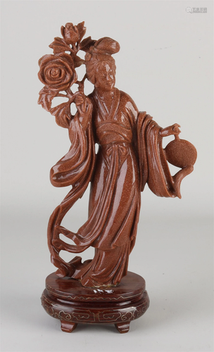 Chinese statue of semi-precious stone, H 24 cm.