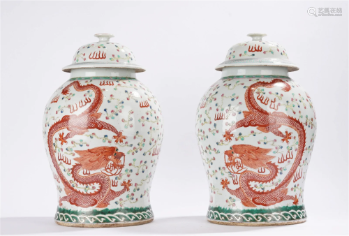 Pair of Famille Rose Qing Period Dragon Jars and Lids