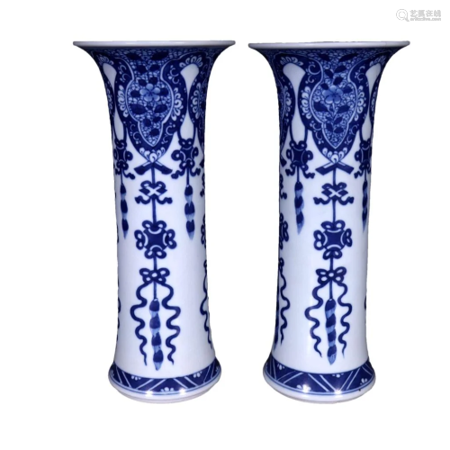 A Pair of Blue And White Flower Gu-form Vases