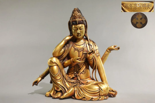 A Fine Gilt-bronze Figure of Six-armed Guanyin