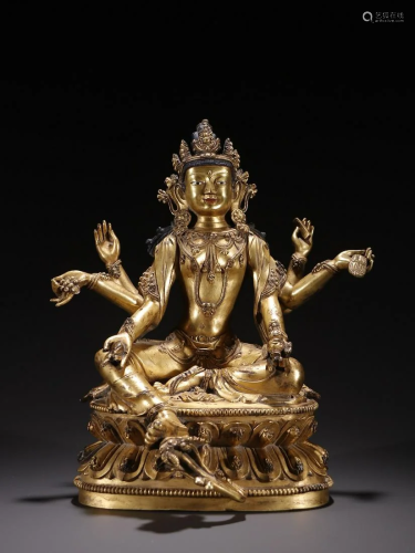A Fine Gilt-bronze Figure of Six-armed Guanyin