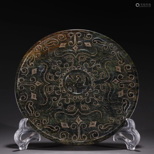 A Rare Jade Disc With 'Tao Tie' Pattern