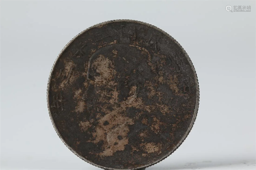 AN ONE-YUAN SILVER COIN.